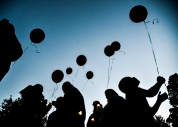A group of family and friends prepare to launch balloons into the sky during a vigil held for Lenard Dean Boyer on Saturday evening at the band shelter at Hitchcock Park in Mitchell. Boyer (14) passed away on June 25, 2015 after suffering fatal injuries in a singe-vehicle accident. Karla Martinez, 23, of Mitchell, the driver of the vehicle who had a blood alcohol level of .148 pleaded guilty in Sept. to vehicular homicide and is scheduled for sentencing on Tuesday. (Matt Gade/Republic)