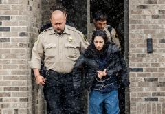 Maricela Diaz is escorted out of the Hanson County Courthouse by Hanson County Sheriff Randy Bartlett after being sentenced for 80 years on Friday afternoon in Alexandria. Diaz was found guilty in January for the murder and kidnapping of Jasmine Guevara that occurred in 2009.. (Matt Gade/Republic)