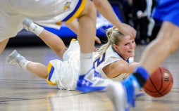 South Dakota State University's Chloe Cornemann (22) tries to chase down a loose ball during a game in the first round of the Summit League conference tournament on Saturday at the Denny Sanford Premier Center in Sioux Falls. (Matt Gade/Republic)