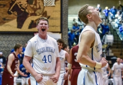 Dakota Wesleyan's Jason Spicer (40) along with Dakota Wesleyan's Tate Martin (11) celebrate Spicer's basket and foul on his rebound put back of Martin's shot attempt during a game against Hastings on Saturday at the Corn Palace in Mitchell. (Matt Gade/Republic)