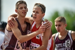 Freeman Academy's Thaniel Schroeder, left, and Gregory's Aaron Voigt walk off the track together after running the 3200 meter during the first day of the Class B state track and field championships on Friday, May 27 at Howard Wood Field in Sioux Falls.