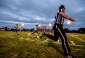 Dakota Wesleyan's Luke Loudenburg (23) races past the Dakota State defense for a touchdown during a game on Thursday night in Madison.